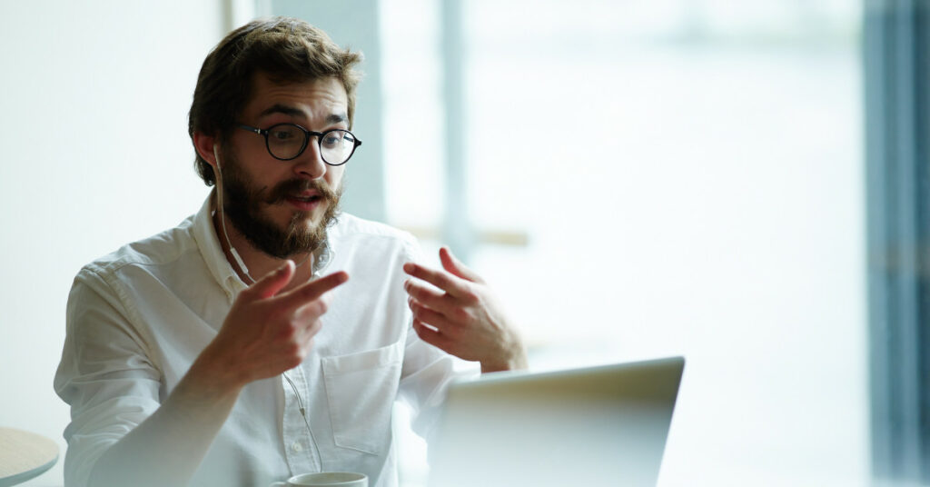 ACTO-Professional-Membership showing a man looking at laptop